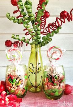 a vase filled with candy sitting on top of a table