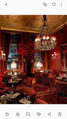 an image of a fancy restaurant setting with chandelier and red lighting in the background