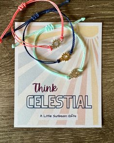 three bracelets with the words think celestial on them