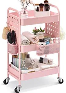 a pink cart filled with lots of cosmetics and personal care items on wheels in front of a white background