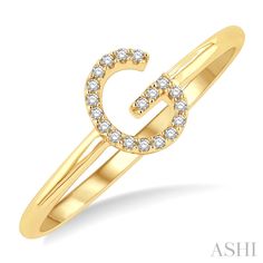 Wearing a piece of jewelry with initials on it is quite common. Initials can be one's own or that of a loved one. Also, initial rings, pendants and bracelets make a good gift item. If yours or a loved one's name starts with the initial 'G', this diamond fashion ring might just be an ideal choice. It features the letter 'G' at the center top of the ring. While the ring is plain gold, the initial 'G' is decorated with diamonds. There are 19 prong set round cut diamonds highlighting the alphabet fa G Initial, Initial G, Initial Rings, G Ring, Trending Engagement Rings, Best Friend Necklaces, Letter Ring, Diamond Fashion Rings, Engagement Rings Bridal Sets