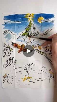 someone is drawing with colored pencils on white paper and has an image of a snowy mountain