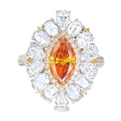 From the Museum Vault At Emilio Jewelry Located on New York's iconic Fifth Avenue, Featuring an ultra rare Gia certified Fancy deep orange diamond as the focal point with no overtone. Please inquire for details. Orange Diamond Ring, Emilio Jewelry, Blue Diamond Rings, Orange Diamond, Orange Jewelry, Blue Diamond Ring, Bath And Body Works Perfume, Deep Orange, Antique Blue