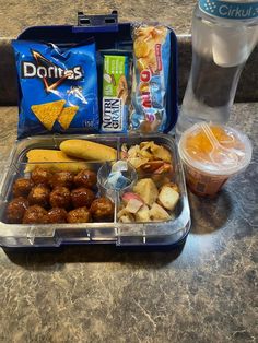 a lunch box filled with snacks and drinks