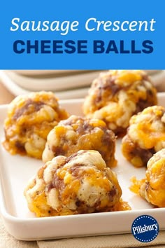 sausage crescent cheese balls on a plate with the title in blue overlay that reads sausage crescent cheese balls