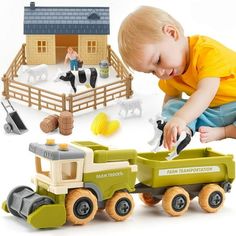 a little boy playing with toys in front of a farm house and tractor set on a white background