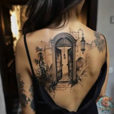 the back of a woman's shoulder with an open door and plants on it