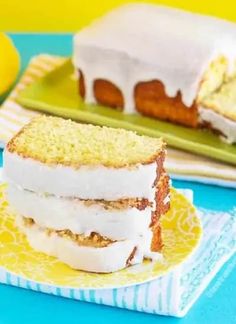 two slices of lemon cake sitting on top of plates