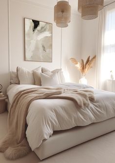 a large bed sitting next to a window in a room with white walls and flooring