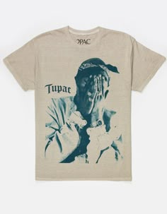 Tupac Me Against The World Tee. Large Graphic On Front. Large Text Screened On Back. Crew Neck. Short Sleeve. 100% Cotton. Machine Wash. Imported. 2pac Graphic Tee, Graphic Tees Tupac, Shirts You Need, Graphic Tees For Women Latest Trends, Graphic Tees Rappers, Rapper T Shirts, Graphic Tee Men Outfit, Winter Graphic Tees, Tupac Clothes