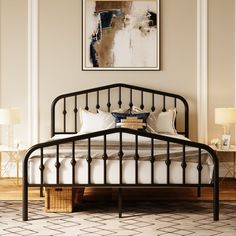 a black metal bed frame with white sheets and pillows in a neutral room, along with two nightstands