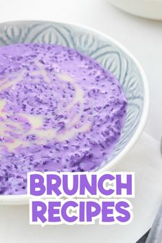 a bowl filled with purple food on top of a table