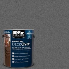 a red paint with the words behr premium on it and an image of a house