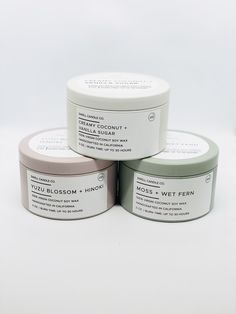 three different types of body scrubs on a white surface