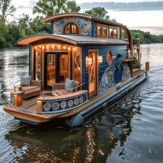 a house boat is floating on the water