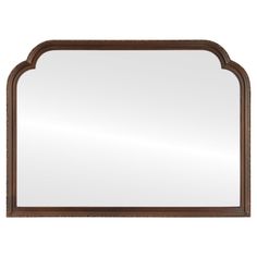 a large mirror with an arched frame and wood trimmings on the edges,