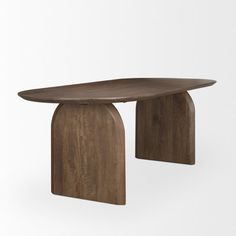 a wooden table with an oval shaped top and curved legs, on a white background