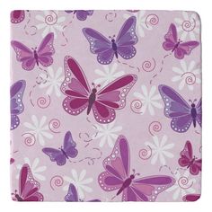 purple butterflies on pink background with swirls and dots stock photo - 1387982