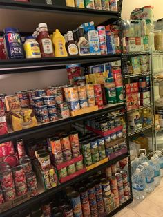 a store filled with lots of different types of canned foods and condiments on shelves