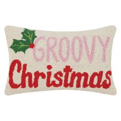 a pillow with the words grooy christmas on it