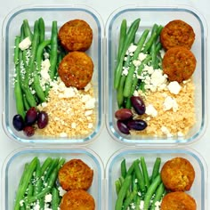 four plastic containers filled with meatballs, green beans and rice covered in feta cheese