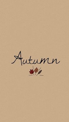 the word autumn written in cursive writing on a beige background