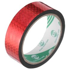 a roll of red tape on white background