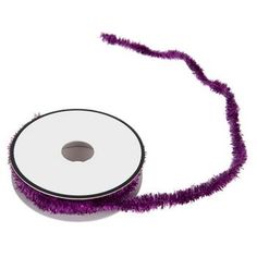 a roll of purple ribbon on a white background