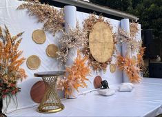 a white table topped with lots of different types of decorations