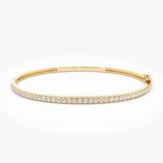 "Diamond Bangle / 14k Gold Stacking Diamond Bangle 0.90 ctw / Stackable Layering Diamond Bangle Bracelet / Gift Ideas by Ferkos Fine Jewelry * Made to Order * Gold Kt: 14K (also available in 18K) * Available Gold Colors: Yellow Gold, White Gold * Width: 2.5 MM * Round Diamond: 37 Pc 1.80MM * Diamond Carat Weight: 0.90 ctw * Diamond Color-Clarity: G Color SI Clarity * Ready to Ship in 1-2 Business Days If you have any additional questions about this ring, just hit the \"Message Ferko\" button and we will get back to you within a few hours. ▶ See more of our  Diamond Bracelets - http://etsy.me/2mVrAB5 ▶ See our storefront here - http://etsy.me/2lUcVnH  ▶ All store sections here * Diamond Rings - http://etsy.me/2lwKUl8 * Diamond Earrings - http://etsy.me/2lyqVBP * Diamond Necklace - http://et Gold Bangle With Diamonds, Classic Yellow Gold Diamond Bangle Bracelet, Gold Hand-set Diamond Bangle Bracelet, Diamond Bangle In Polished Yellow Gold, Classic Gold-plated Diamond Bangle Bracelet, Yellow Gold Diamond-accented Cuff Bangle, Eternity Bracelet, Solid Gold Bracelet, The Bangles