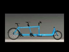 a blue bike with two bicycles attached to it