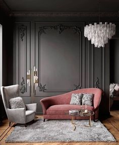 a living room filled with furniture and a chandelier