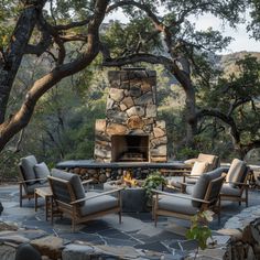 an outdoor fireplace surrounded by chairs and tables