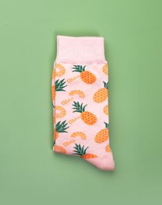 Women's tropical socks with pineapples, pineapples and more pineapples. What's not to love about the Aloha Pineapple Crew Socks with this delicious fruit on a soft pink background. These pineapple crew socks for women make a great gift for any gal who loves to show off her unique style. Whether you're wearing these pink socks to the office, out for a night on the town, or just lounging at home, the Aloha Pineapple Crew Socks are sure to bring back memories of a tropical vacation and add a touch Soft Pink Background, Pink Socks, Socks For Women, Pineapple Print, Delicious Fruit, Tropical Vacation, Bring Back, Pink Background, Crew Socks