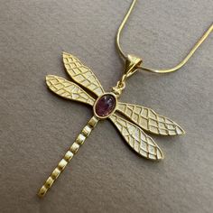 TOURMALINE DRAGONFLY NECKLACE  Material: 18k gold plated high quality solid 925 Sterling Silver All pieces will come with a 2" extension chain so you can fine tune the fit. **HOW TO CARE FOR YOUR JEWELRY *Maintain your jewelry's high shine by avoiding contact with any chemicals such as soap, perfume, lotion, makeup, hair & cleaning products. *When you do not use the jewelry you bought, you can always keep it in a pouch or box, reducing its contact with oxygen and using it for many years with its Schmuck Gold, Dragonfly Jewelry, Good Luck Gifts, Dragonfly Necklace, Dragonfly Pendant, Bird Necklace, Summer Jewelry, Jewelry Gold, Solid 925 Sterling Silver