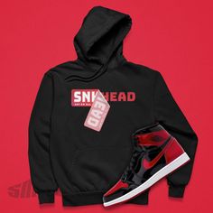 *Air Jordan 1 Retro Patent Bred Sneakerhead Sticker Hoodie, Retro 1 Sweatshirt, AJ1 SVG, Basketball Gift. Designed to match Style Code:555088-063. Cozy go-to hoodie to curl up in, so go for one that's soft, smooth, and stylish. It's the perfect choice for cooler evenings! Shoes Not Included Custom Made - Not Jordan Brand or Nike Sneaker Hoodie * 50% pre-shrunk cotton, 50% polyester * Fabric weight: 8.0 oz/yd² (271.25 g/m²) * Air-jet spun yarn with a soft feel and reduced pilling * Double-lined h Air Jordan 1 Patent Bred, Basketball Gifts, Nike Sneaker, Retro 1, Air Jordan 1 Retro, Jordan 1 Retro, Air Jet, Air Jordan 1, Sneaker Head