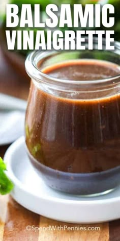 balsamic vindignelle sauce in a glass jar on a white plate