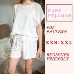 a woman wearing white shorts and a t - shirt with the words easy pyjamas on it