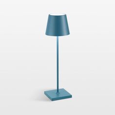 a blue lamp on a white background