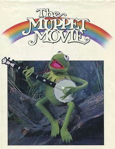 the muppet movie book is shown with an image of kermik holding a guitar