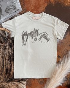 Printed on unisex fit Sand color Gildan t-shirt  Made to order, please allow up to 6 days for create time MADE TO ORDER JUST FOR YOU —FINAL SALE ITEM Nice Western Shirts, Western Horse Shirt, Horse T Shirt Design, Modesty Journey, Liberty Black Boots, Horse T Shirt, 3 Horses, Womens Hats, Moms Goals