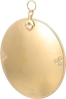 an antique gold pocket watch on a white background