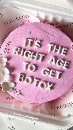 it's the right age to get botox on top of a pink cake