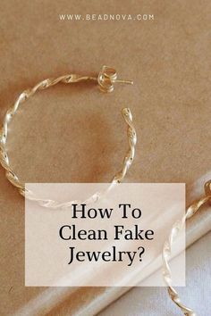 the words how to clean fake jewelry on top of a white sheet with an image of a