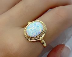 Natural Opal Ring - Gold Ring Opal - 14k Gold Ring - Oval Opal Ring - Gold And Opal - Opal Jewelry - White Opal Ring - Gift For Wife *100% naturel gemstone *14k solid gold *solid gold (NOT plated) *gemstone: opal *stone shape opal: oval *stone opal ct. : 3.00-3.80 ct. *stones opal : 1 pc. Victorian Opal Ring, Opal Ring Settings, Gold Opal Jewelry, White Gold Opal Ring, Oval Opal Ring, Calligraphy Flowers, Opal Statement Ring, Opal Ring Vintage, Oval Solitaire Engagement Ring