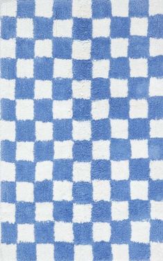 a blue and white rug with squares on it