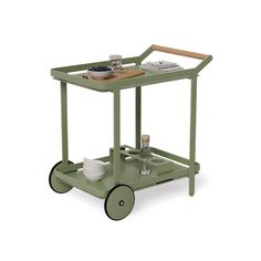 a green serving cart with plates and bowls on it's wheels, sitting against a white background