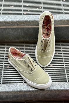 Slip on and go! These Malia Blowfish sneakers are a beautiful eucalyptus / sage green color with a pull-on design (no shoe lace tying required!) Typical Blowfish fit (true to size and usually a bit narrow.) Note for Online Shoppers: All of our shoes are available in our retail storefront. While they are indeed brand new, they could have been tried on in-store. Blowfish Sneakers, Shoe Lace Tying, Sage Green Color, Tie Shoelaces, Shoe Lace, Store Fronts, Sage Green, Green Colors, Green Color