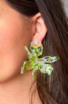 At BuddyLove, we LOVE an accessory so Grayson designed the ultimate statement earrings to make accessorizing your BuddyLove pieces easier than ever! These bright citron tropical earrings will have you ready for a vacation! This item is FINAL SALE. Trendy Green Earrings For Spring, Fun Earrings For Spring Party, Fun Party Earrings For Spring, Playful Green Earrings For Party, Green Flower Earrings For Party, Fun Spring Party Earrings, Yellow Earrings For Spring Vacation, Neon Yellow Jewelry For Summer Gift, Playful Green Earrings For Parties