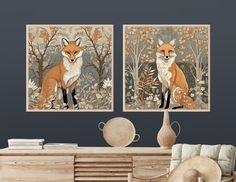 two paintings of foxes are hanging on the wall above a desk with a chair in front of it